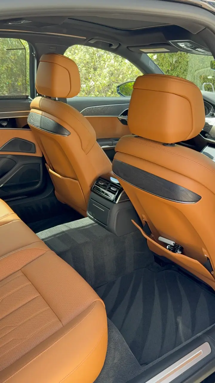 Tan leather rear seats, spotless after an interior detail